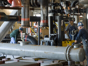 Fagan plumbing team working on equipment